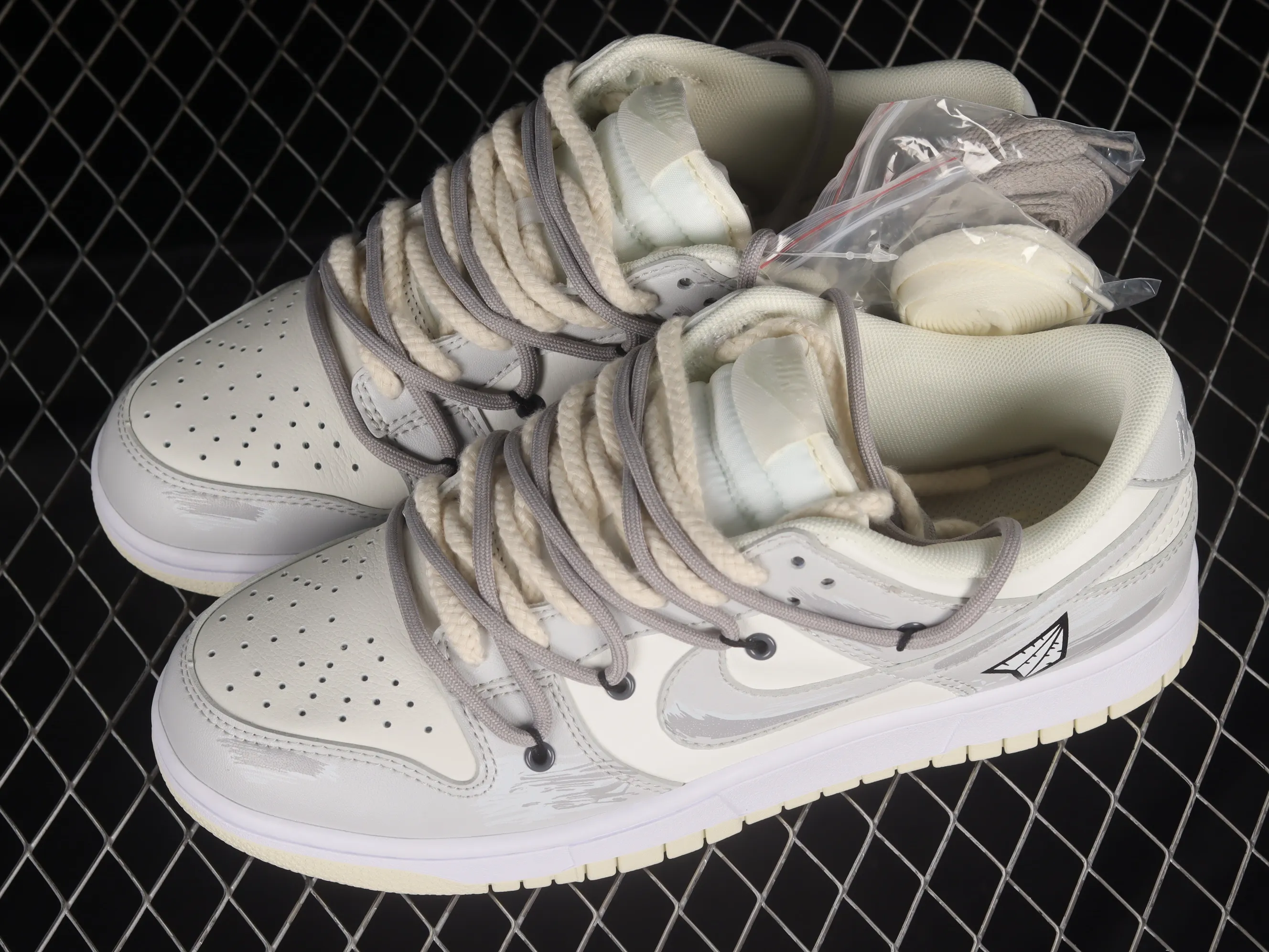 All Categories Nk SB Dunk Series Nk SB Dunk Low Low-top Sneakers Nk Dunk Low Retro "Coconut Milk" Vibe Wind Distressed Paper Plane Travel Graffiti Customized Deconstructed Strap Casual Sneakers DJ6188-100